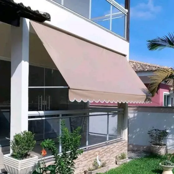 Toldo Cortina com Braço em loja de rua